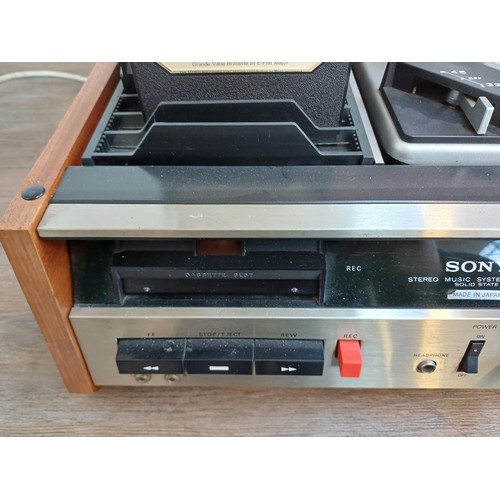 384 - A Sony HP-239A solid state stereo music system comprising two-speed turntable, cassette recorder, tw... 