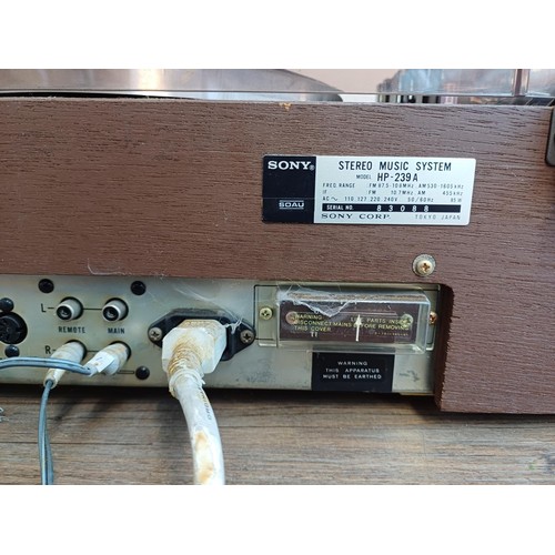 384 - A Sony HP-239A solid state stereo music system comprising two-speed turntable, cassette recorder, tw... 