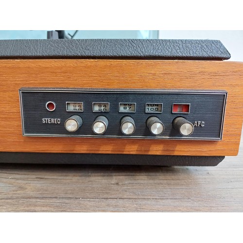 386 - A rare mid 1970s Dynatron HFC40 stereo music system comprising FM tuner, amplifier and Garrard SP25 ... 