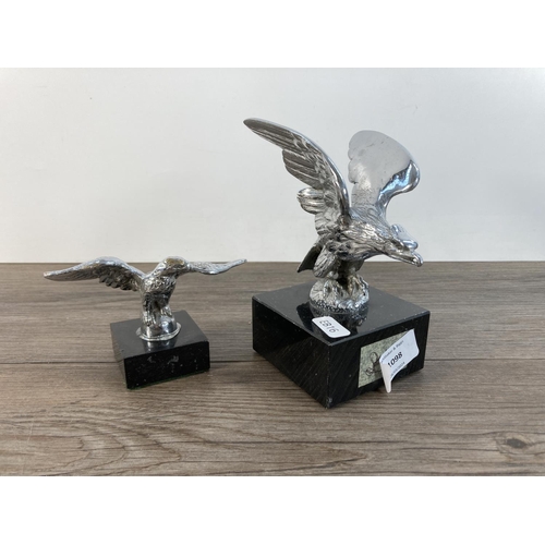 1098 - Two vintage cast metal birds of prey figurines - largest approx. 15cm high