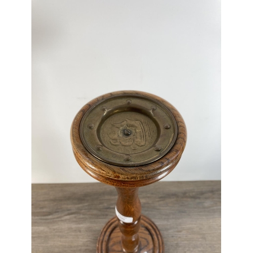 1100 - A vintage oak floor standing ashtray with nautical brass top - approx. 49cm high