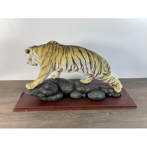 1103 - A resin white tiger figurine - approx. 30cm high x 55cm long