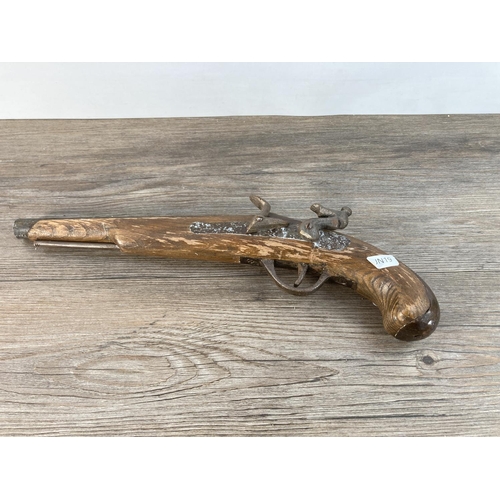 1108 - A handmade ornamental flintlock pistol - approx. 37cm long