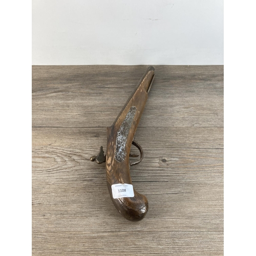 1108 - A handmade ornamental flintlock pistol - approx. 37cm long