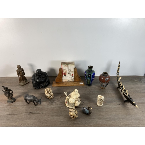 1111 - Thirteen Oriental items to include two Chinese Cloisonné vases, resin netsuke, resin Buddha figurine... 