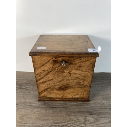 1131 - A late 19th century walnut concealed jewellery box with three internal drawers - approx. 20cm high x... 