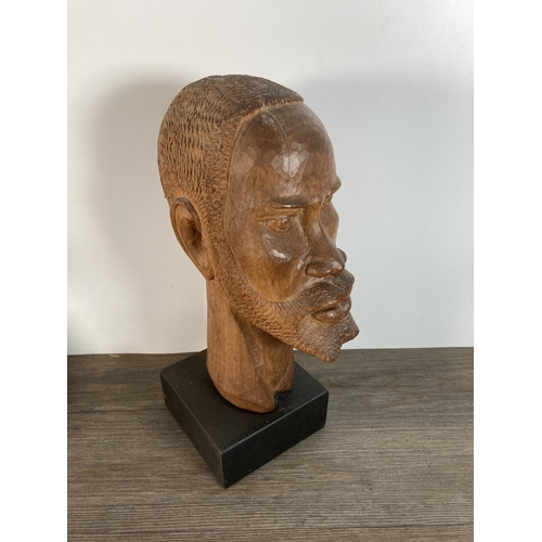 1138 - Two vintage carved hardwood African busts - approx. 32cm high