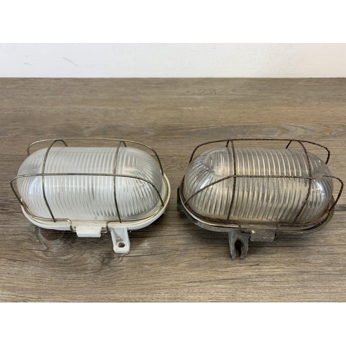 1038 - Two industrial bulkhead wall lights