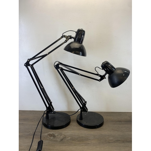 1044 - A pair of Lloytron swing arm hobby lamps