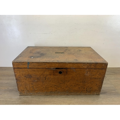 1045 - A 19th century oak rectangular storage box with brass handles - approx. 25cm high x 56cm wide x 32cm... 