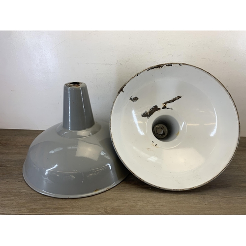 1050 - A pair of mid 20th century grey and white enamel factory ceiling light shades - approx. 45.5cm in di... 