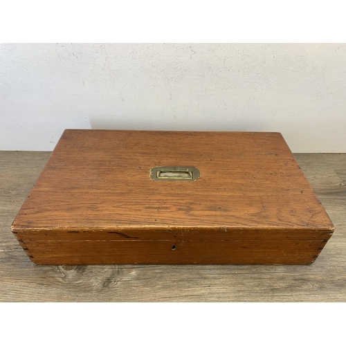 1052 - A late 19th/early 20th century mahogany rectangular storage box with brass handle - approx. 11cm hig... 