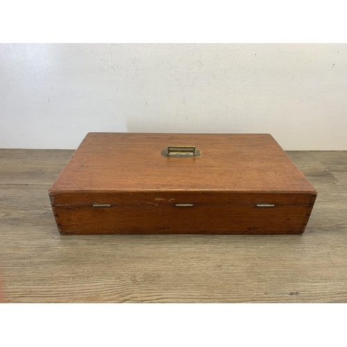 1052 - A late 19th/early 20th century mahogany rectangular storage box with brass handle - approx. 11cm hig... 