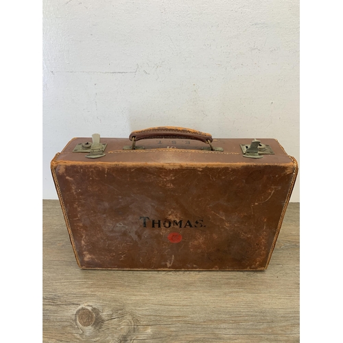 1056 - An early 20th century brown leather briefcase - approx. 11cm high x 40cm wide x 26.5cm deep