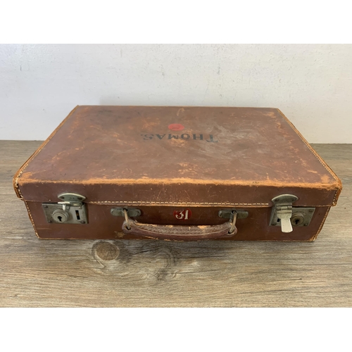 1056 - An early 20th century brown leather briefcase - approx. 11cm high x 40cm wide x 26.5cm deep