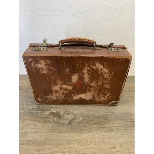 1056 - An early 20th century brown leather briefcase - approx. 11cm high x 40cm wide x 26.5cm deep