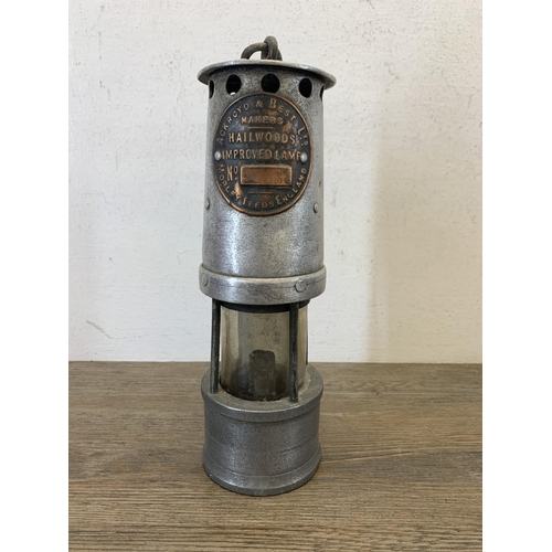 1063 - A vintage Ackroyd & Best Ltd. aluminium and steel miner's lamp - approx. 24.5cm high