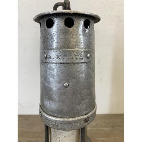 1063 - A vintage Ackroyd & Best Ltd. aluminium and steel miner's lamp - approx. 24.5cm high