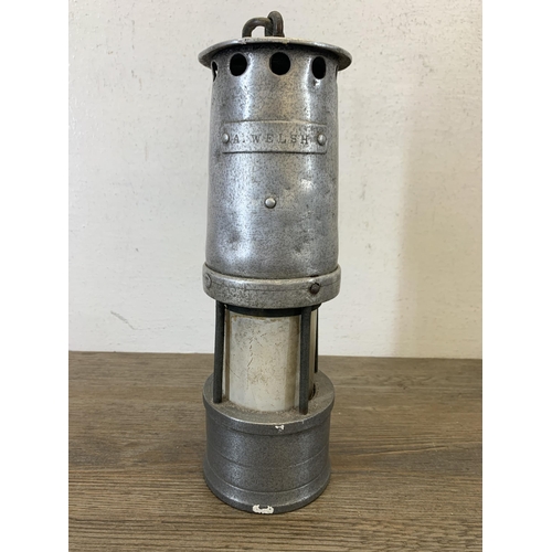 1063 - A vintage Ackroyd & Best Ltd. aluminium and steel miner's lamp - approx. 24.5cm high