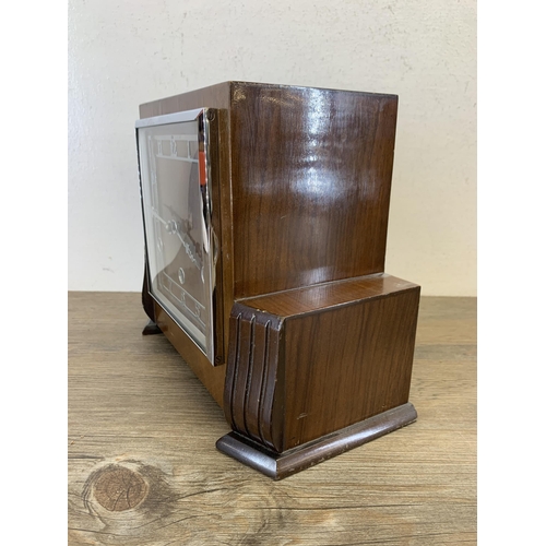 1073 - An Art Deco mahogany cased Westminster chime mantel clock