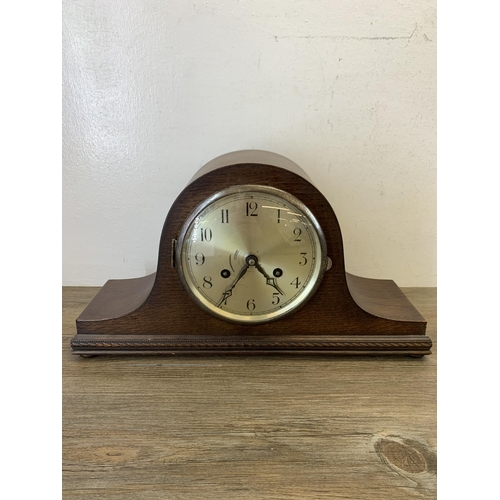 1076 - Two early/mid 20th century oak cased Napoleon hat chiming mantel clocks