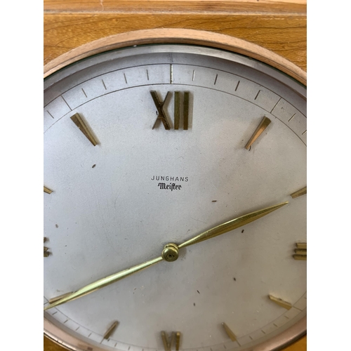 1079 - A mid 20th century walnut and brass cased mantel clock - approx. 16cm high x 18cm wide