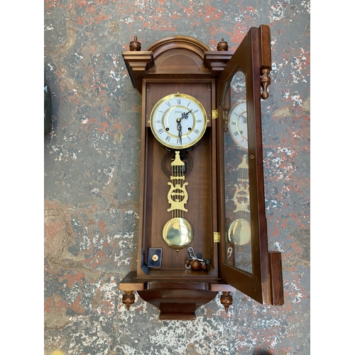 1082 - A late 20th century Highlands mahogany cased chiming Vienna wall clock - approx. 86cm long