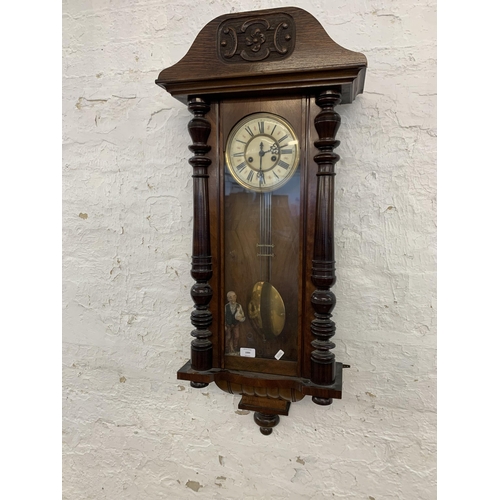 1084 - A Victorian mahogany cased Vienna chiming wall clock - approx. 106cm long x 39.5cm wide