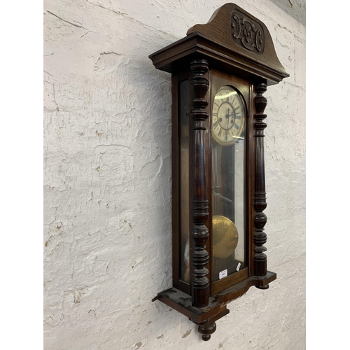 1084 - A Victorian mahogany cased Vienna chiming wall clock - approx. 106cm long x 39.5cm wide