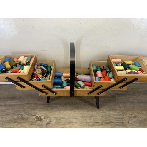 1087 - A mid 20th century beech and ebonised cantilever sewing box - approx. 46cm high