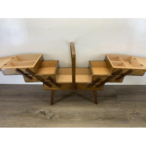 1088 - A mid 20th century plywood cantilever sewing box - approx. 44cm high