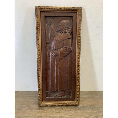 1095 - A vintage hand carved wooden panel of a fisherman in gilt frame - approx. 55cm high x 24cm wide