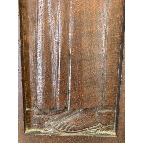 1095 - A vintage hand carved wooden panel of a fisherman in gilt frame - approx. 55cm high x 24cm wide