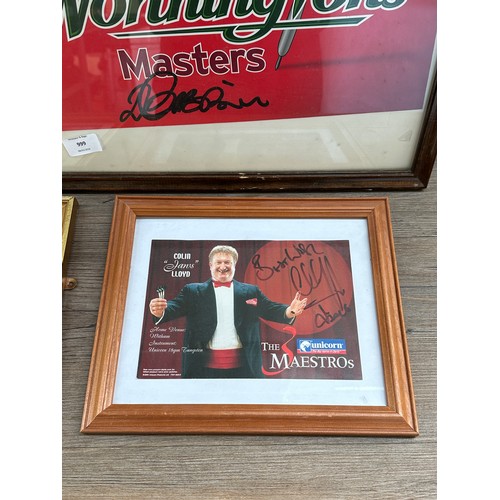 999 - Four framed hand signed darts prints to include world champion Phil Taylor, Colin Lloyd etc.