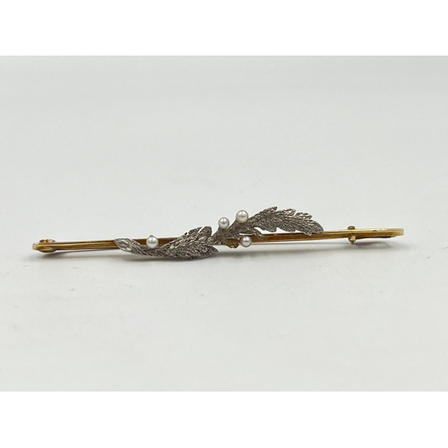 2332 - A late 19th/early 20th century 15ct gold and platinum seed pearl set foliate brooch - approx. gross ... 