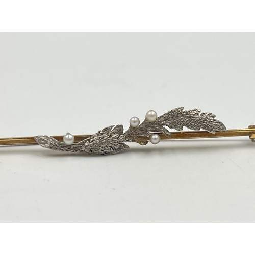 2332 - A late 19th/early 20th century 15ct gold and platinum seed pearl set foliate brooch - approx. gross ... 