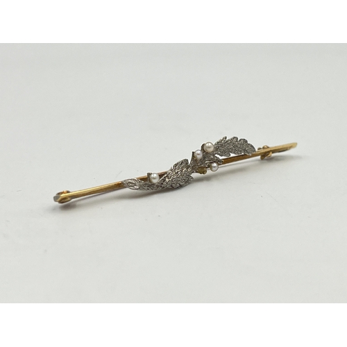 2332 - A late 19th/early 20th century 15ct gold and platinum seed pearl set foliate brooch - approx. gross ... 