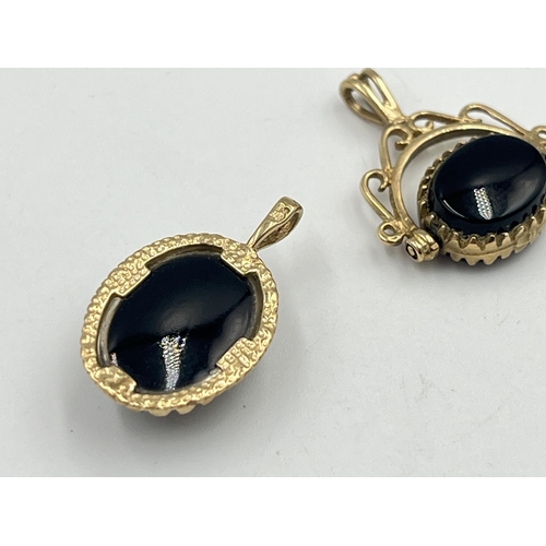 2358 - Two pieces of jewellery, one hallmarked 9ct gold black onyx pendant and one yellow metal carnelian a... 