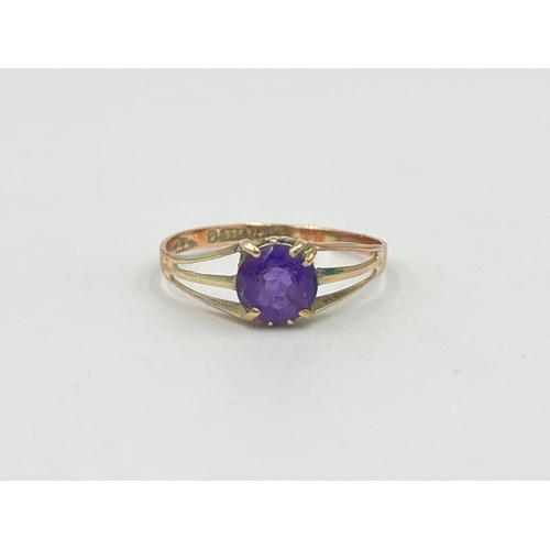 2362 - A hallmarked Birmingham 9ct gold amethyst solitaire ring, size O - approx. gross weight 1g