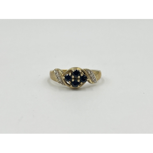 2366 - A 9ct gold sapphire and diamond dress ring, size O - approx. gross weight 2.4g