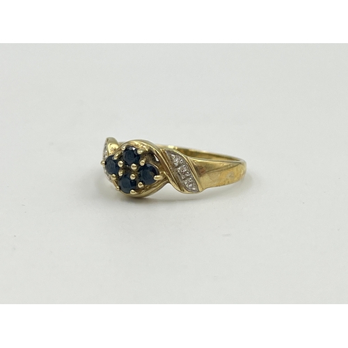 2366 - A 9ct gold sapphire and diamond dress ring, size O - approx. gross weight 2.4g