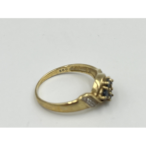 2366 - A 9ct gold sapphire and diamond dress ring, size O - approx. gross weight 2.4g