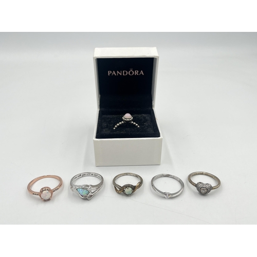 2367 - Six .925 silver rings to include two Pandora, 9ct and .925 opal solitaire etc. - approx. gross weigh... 