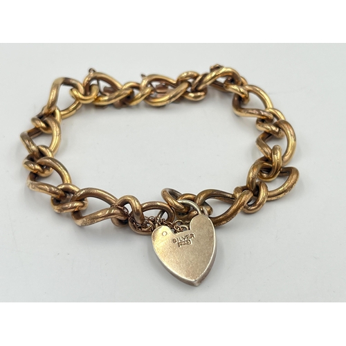 2368 - An antique yellow metal turquoise set bracelet with foliate design and silver heart shaped locket - ... 