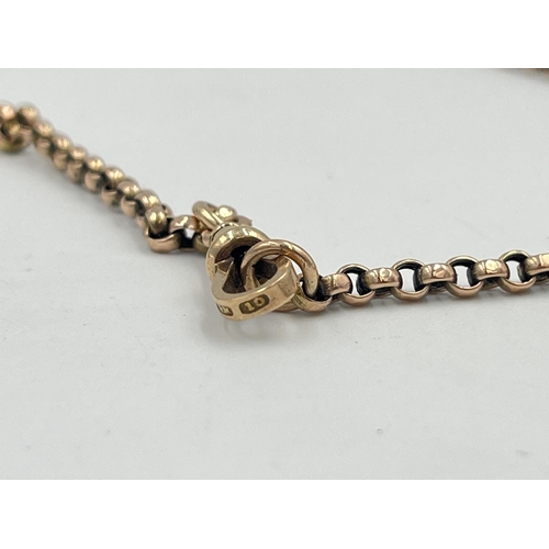 2371 - An antique yellow metal muff chain stamped '10' to clasp - approx. gross weight 20g