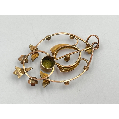 2372 - An Art Nouveau 9ct gold peridot and seed pearl pendant - approx. gross weight 2g