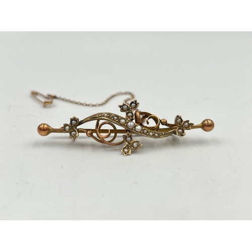 2374 - A late 19th/early 20th century 9ct gold seed pearl set brooch with base metal pin - approx. gross we... 