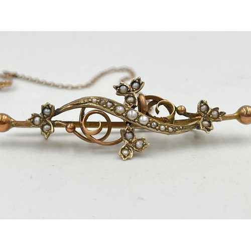 2374 - A late 19th/early 20th century 9ct gold seed pearl set brooch with base metal pin - approx. gross we... 