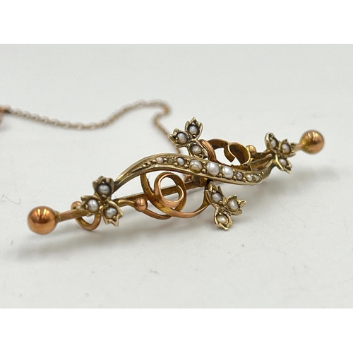 2374 - A late 19th/early 20th century 9ct gold seed pearl set brooch with base metal pin - approx. gross we... 