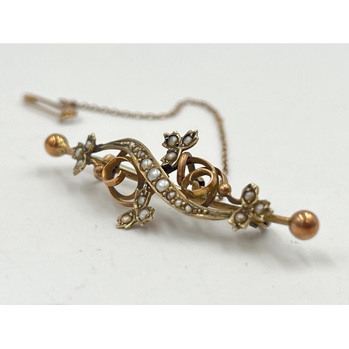 2374 - A late 19th/early 20th century 9ct gold seed pearl set brooch with base metal pin - approx. gross we... 